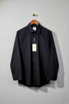 Black men's anti-stain formal shirt on hanger